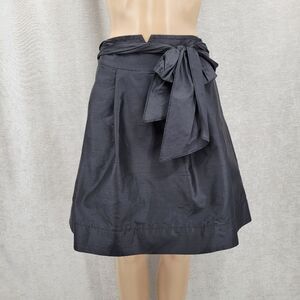 Trina Turk Silk Crepe Black A-Line Pleated Midi Skirt Bow Ties Waist Pockets